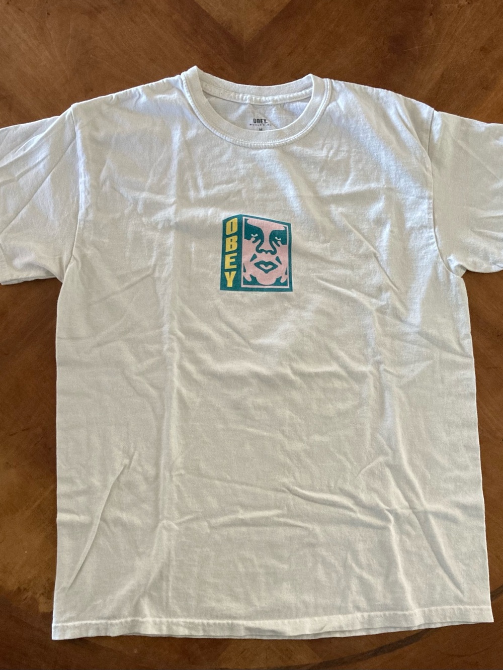 M men’s Obey White Short Sleeve Tee with “Andre The Giant” graphic